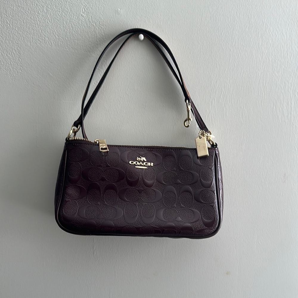 Coach shoulder bag. Burgundy with Gold Accents
